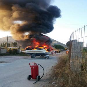 Burning Boat Cause of Fire on Gata Road.